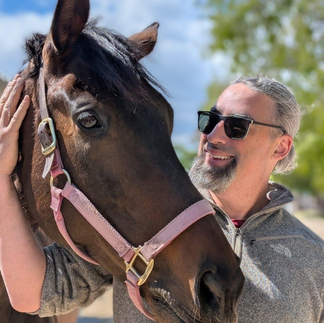 Sam Tregar with a horse